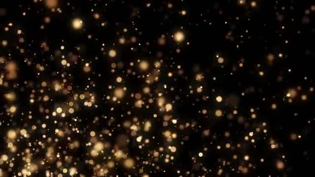 浮き上がる金のパーティクルの動画|無料の動画素材サイト「動画AC」